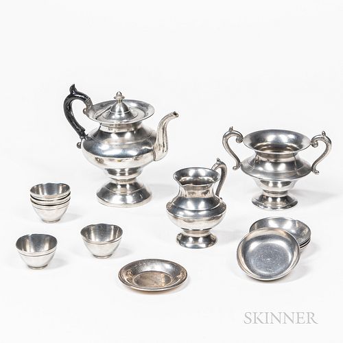 Miniature Pewter Tea Set, possibly Roswell Gleason, Dorchester, Massachusetts, c. 1830-50, including a teapot, creamer, sugar bowl, and