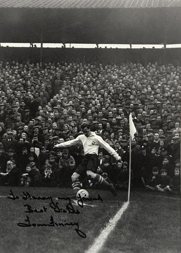 Tom Finney, English Footballer, taking a corner kick with a crowded stand behind, inscribed 'To Harr