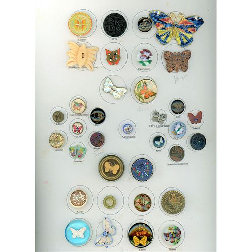 A FULL CARD OF ASSORTED MATERIAL BUTTERFLY BUTTONS
