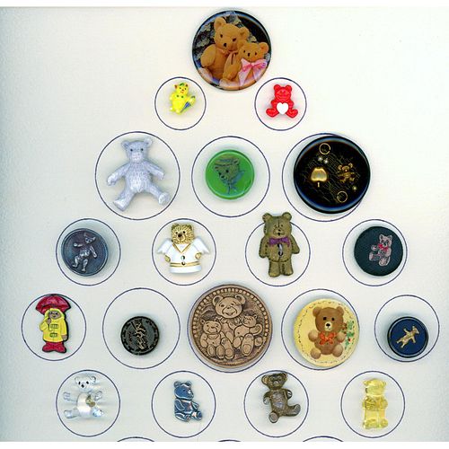 A SMALL CARD OF ASSORTED MATERIAL TEDDY BEAR BUTTONS