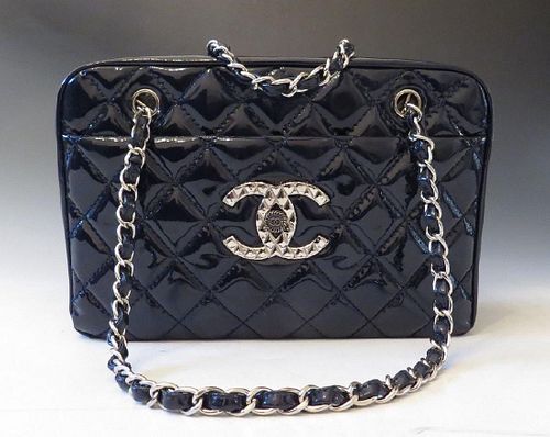 A Chanel blue quilted patent leather tote bag