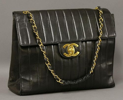 A Chanel black lambskin leather 'Mademoiselle' classic