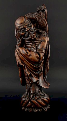 Chinese carved hardwood figure of a man with a wide brimmed hat and fly swat, 36.5cm high,