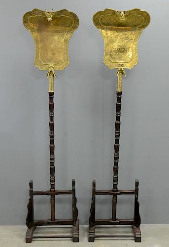 Pair of Chinese gilt bronze fan shaped banner plaques supported on tall turned wooden poles, each ba