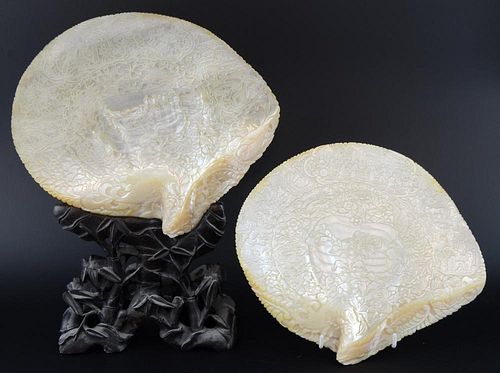 Pair of 19th century Chinese Mother of pearl shells carved with landscapes, 25cm by 23cm  one with c