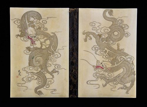 Chinese carved ivory mounted wallet, decorated with dragons amongst clouds, signed, 11cm x 7.5cm,