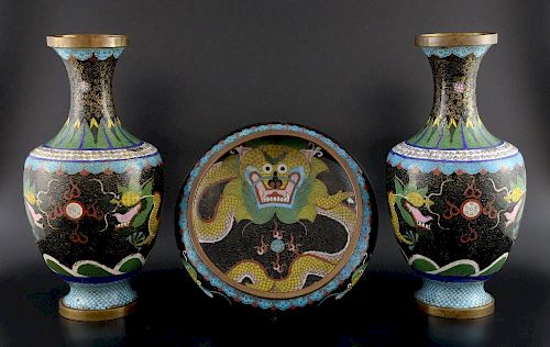 Pair of Chinese cloisonn‚ black ground vases decorated with yellow dragons chasing the flaming pearl