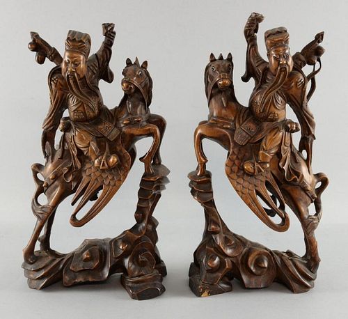 Pair of Chinese carved wood figures on horseback, 36cm high,