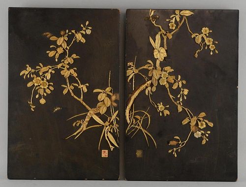 Pair of Japanese black lacquered panels with overlaid bone and mother of pearl floral and foliate de