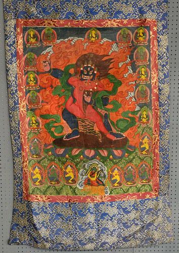 Tibetan Thangka painting depicting a figure with sharp pointed teeth being embraced by a red-skinned