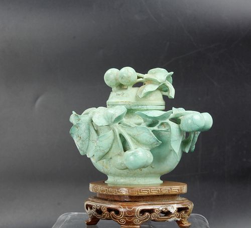 A Chinese Caved Turquoise Lidded Vase on the Wood Base