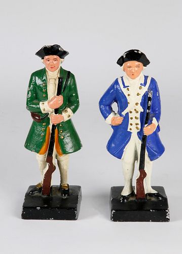 Two Vintage Cast Iron Painted Doorstops of Colonial Soldiers