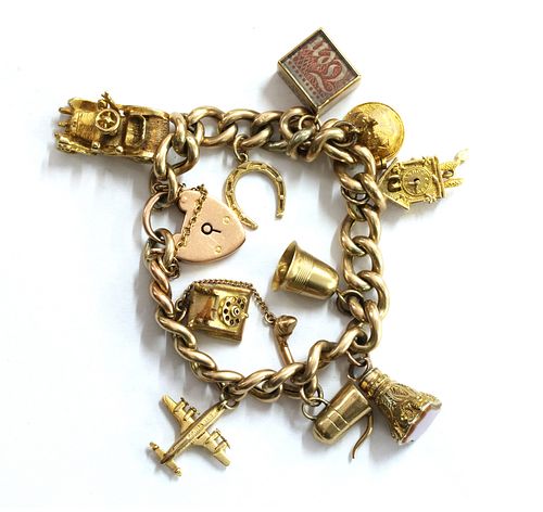 A gold charm bracelet,