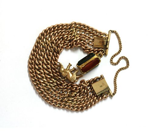 A gold four row curb bracelet,