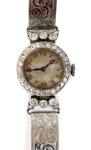 An Art Deco ladies' diamond set mechanical cocktail watch, c.1925,