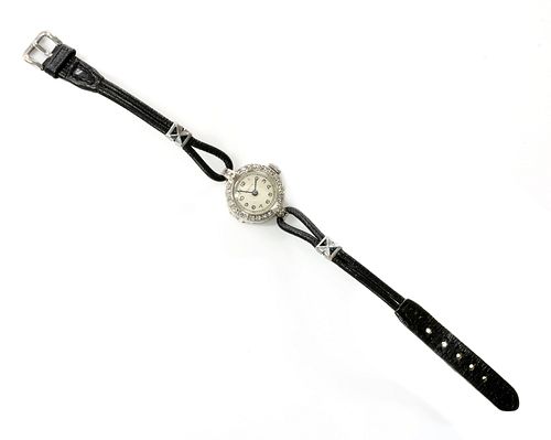 A ladies' 18ct white gold diamond set Vertex mechanical strap watch, c.1930,