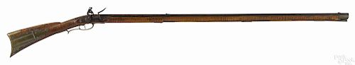 Full stock Pennsylvania flintlock long rifle, signed indistinctly on barrel flat, .45 caliber
