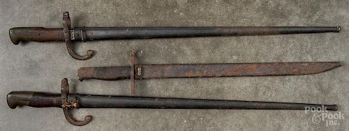 Three bayonets, to include two French Lebel and one Japanese Type 30.