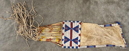 Plains Native American beaded hide tobacco bag, ca. 1900, 24'' h.