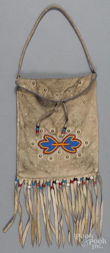 Native American Indian beaded hide pouch, 20th c., 17 1/2'' l., 8 3/4'' w.
