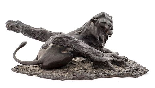 Patinated Bronze Sculpture Of A Recumbent Lion