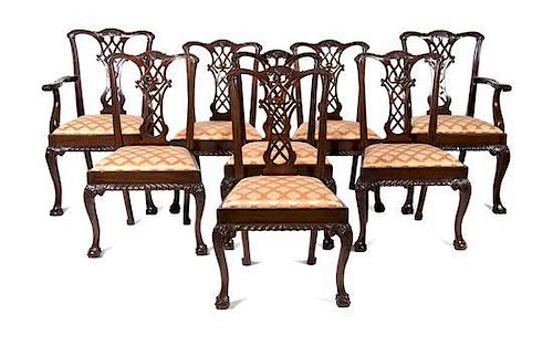 A Set of Eight Chippendale Style Carved Mahogany Dining Chairs Height 38 1/2 inches.