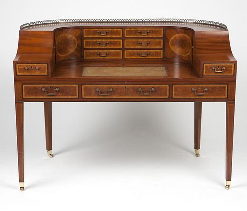 An English Carlton House satinwood desk