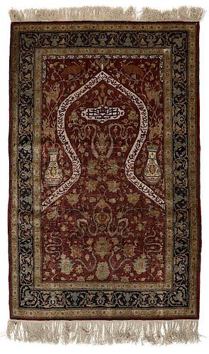 A Turkish Hereke Koum Kapi silk carpet