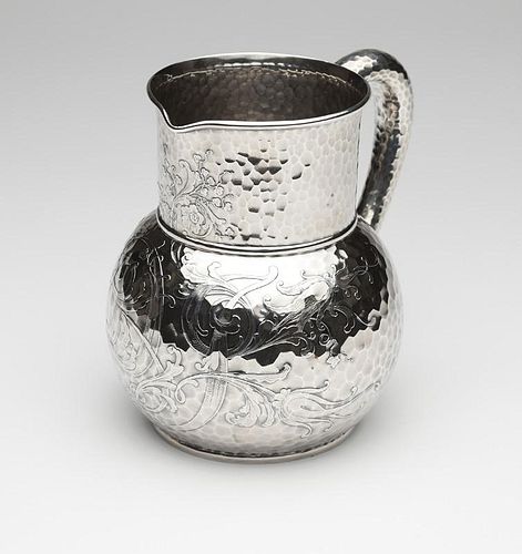 A Tiffany & Co. sterling silver water pitcher