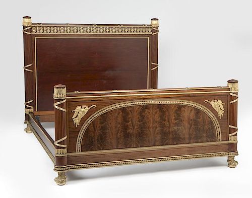 A king-size mahogany and gilt bronze-mounted bed