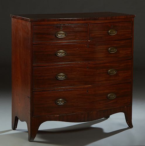 English Carved Mahogany Georgian Style Bowfront Chest, 19th c., the bowed top over two frieze drawers above three deep drawers, on splayed legs joined
