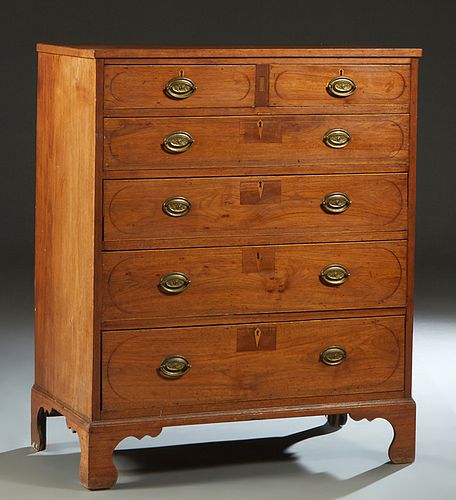 English Inlaid Mahogany Georgian Style Chest, 19th c., the rectangular two board top over two frieze drawers and four graduated drawers, on a plinth b