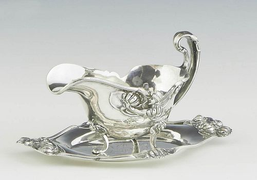 American Sterling Art Nouveau Gravy Boat, c. 1900, with relief floral decoration, with a matching underplate with like decoration, Boat- H.- 3 3/4 in.