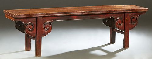 Large Chinese Carved Elm Bench, Qing dynasty, Shanxi province, 19th c., the rectangular top over a serpentine skirt with pierced brackets, on square b