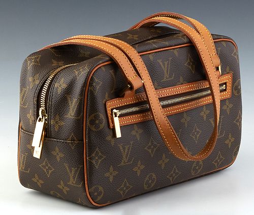 Louis Vuitton Cite MM Shoulder Bag, in a brown monogram coated canvas, with vachetta leather accents and golden brass hardware, H.- 6 1/2 in., W.- 10 