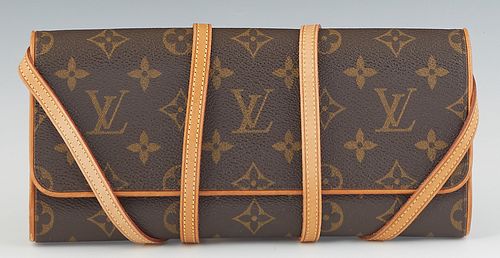 Louis Vuitton Twin GM Shoulder Bag, in a brown monogram coated canvas, with vachetta leather accents and golden brass hardware, H.- 4 1/2 in., W.- 10 