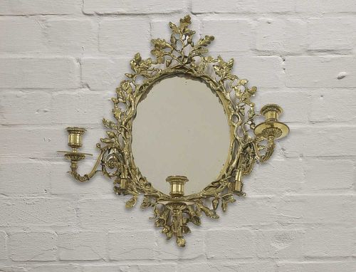 A gilt brass girandole wall mirror,