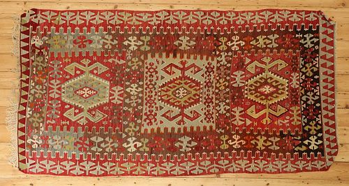 A kilim flatweave rug,