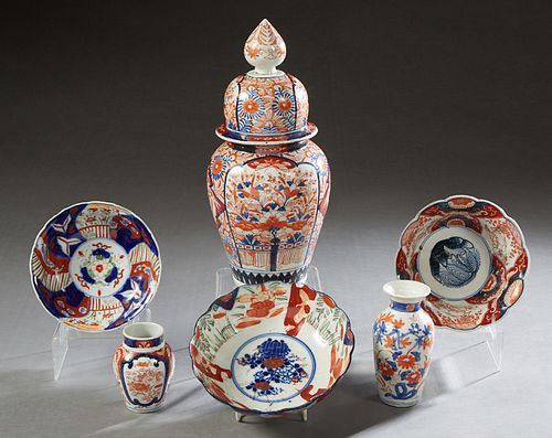 Group of Six Pieces of Japanese Imari, 20th c., consisting of a covered jar, 3 bowls, and 2 baluster vases, all in typical Imari palettes of orange, c