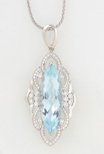 Platinum Pendant, with a 10.58 carat marquise aquamarine, atop a pierced border mounted with round diamonds, on a tiny platinum twisted link chain, to