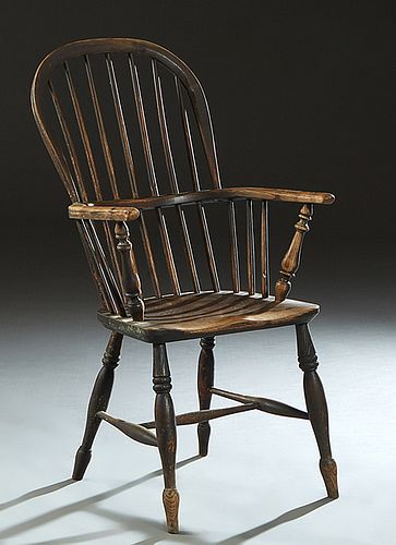 English Georgian Style Yew Wood Windsor Armchair, 19th c. the arched spindled back to curved spindled arms over a shaped seat, on turned splayed legs 