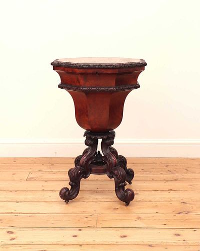 A Victorian flame mahogany teapoy by Gillows of Lancaster,