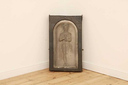 A relief carved basalt panel or stele,