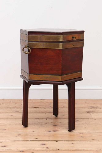 A George III mahogany brass-bound wine cooler and stand,