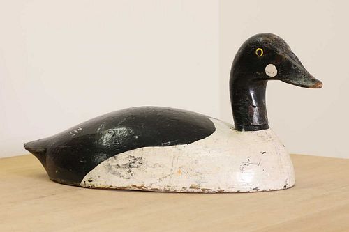 A painted pine decoy duck,