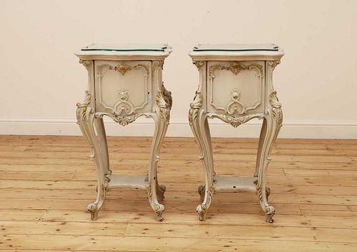 A pair of French Louis XV-style painted bedside tables,