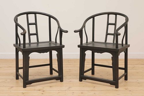 A pair of Chinese-style ebonised softwood armchairs,