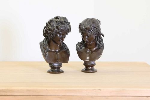 A pair of grand tour bronze busts of Antinous as Dionysus and Ariadne,