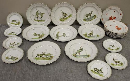 NYMPHENBERG. Lot of Porcelain Plates and Bowls.
