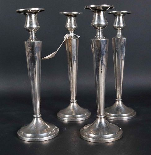 Four E. Caldwell Sterling Silver Candlesticks